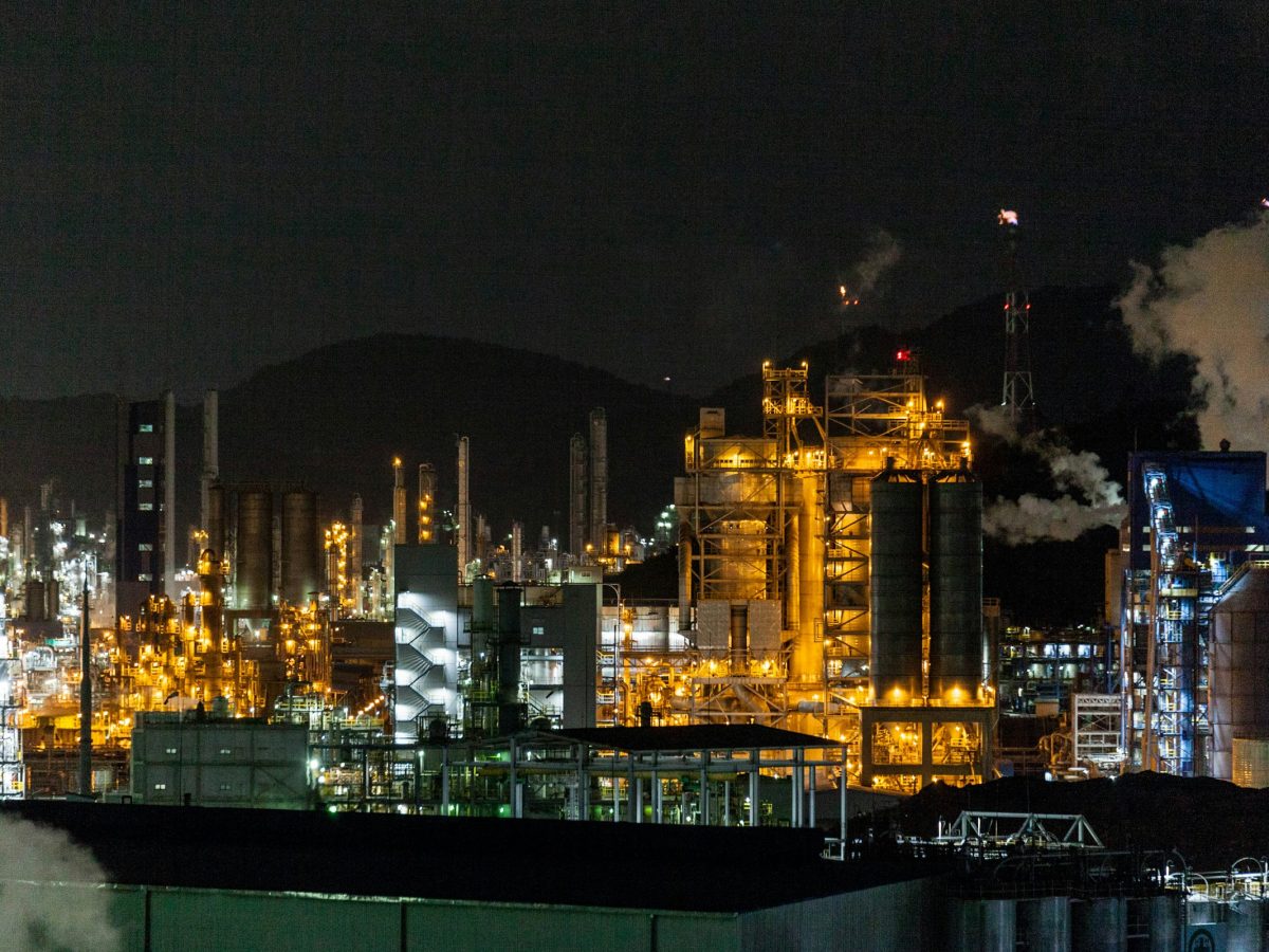 A petroleum refinery lit at night